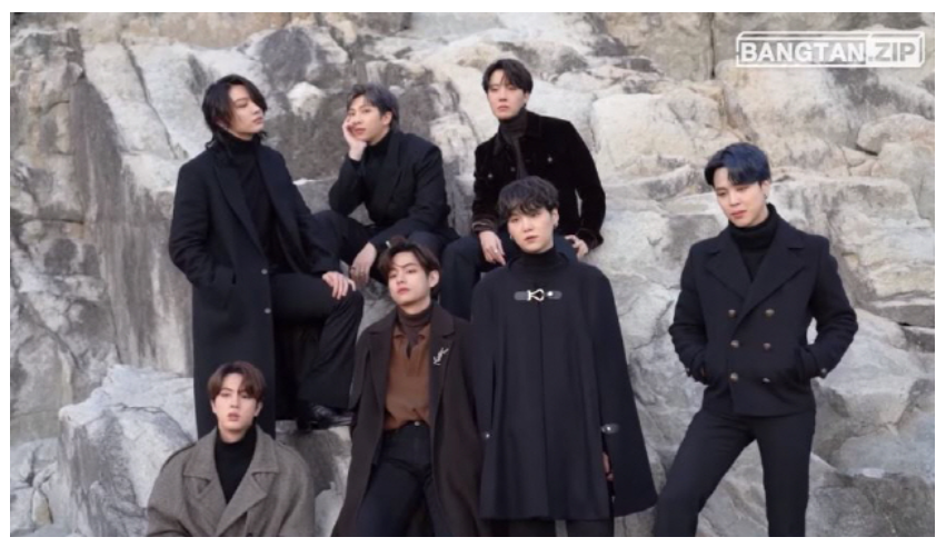 BTS members posing together for their 2021 Winter Package photoshoot at Neungpadae Goseong.