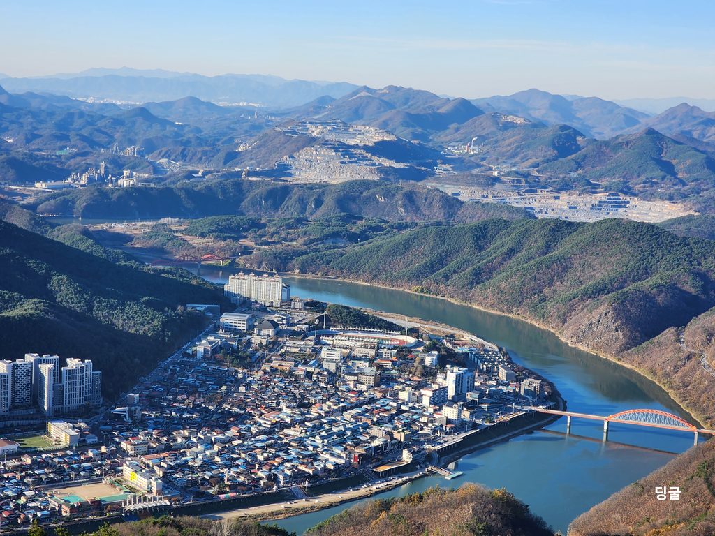 A panoramic wide-angle view of Danyang town, the river, and surrounding peaks from Yangbangsan.